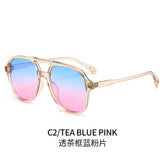 (6 PACK) Wholesale Sunglasses Double Bridge Round Aviator Outdoor 2024 - BulkSunglassesWholesale.com - Clear Tea Frame Blue Pink Lens